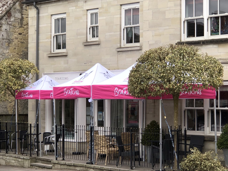 Three printed gazebos on outdoor terrace